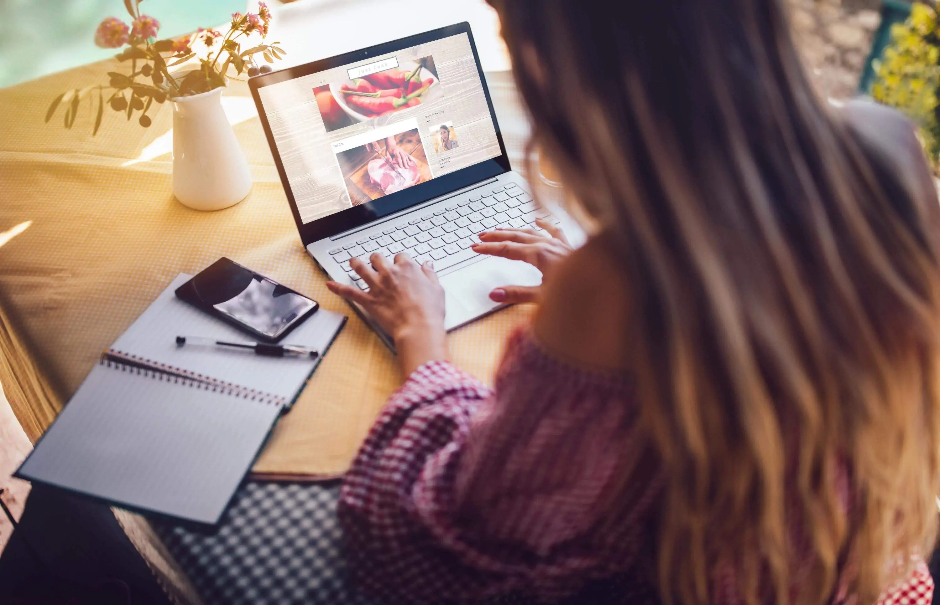 Woman is searing on a restaurant website